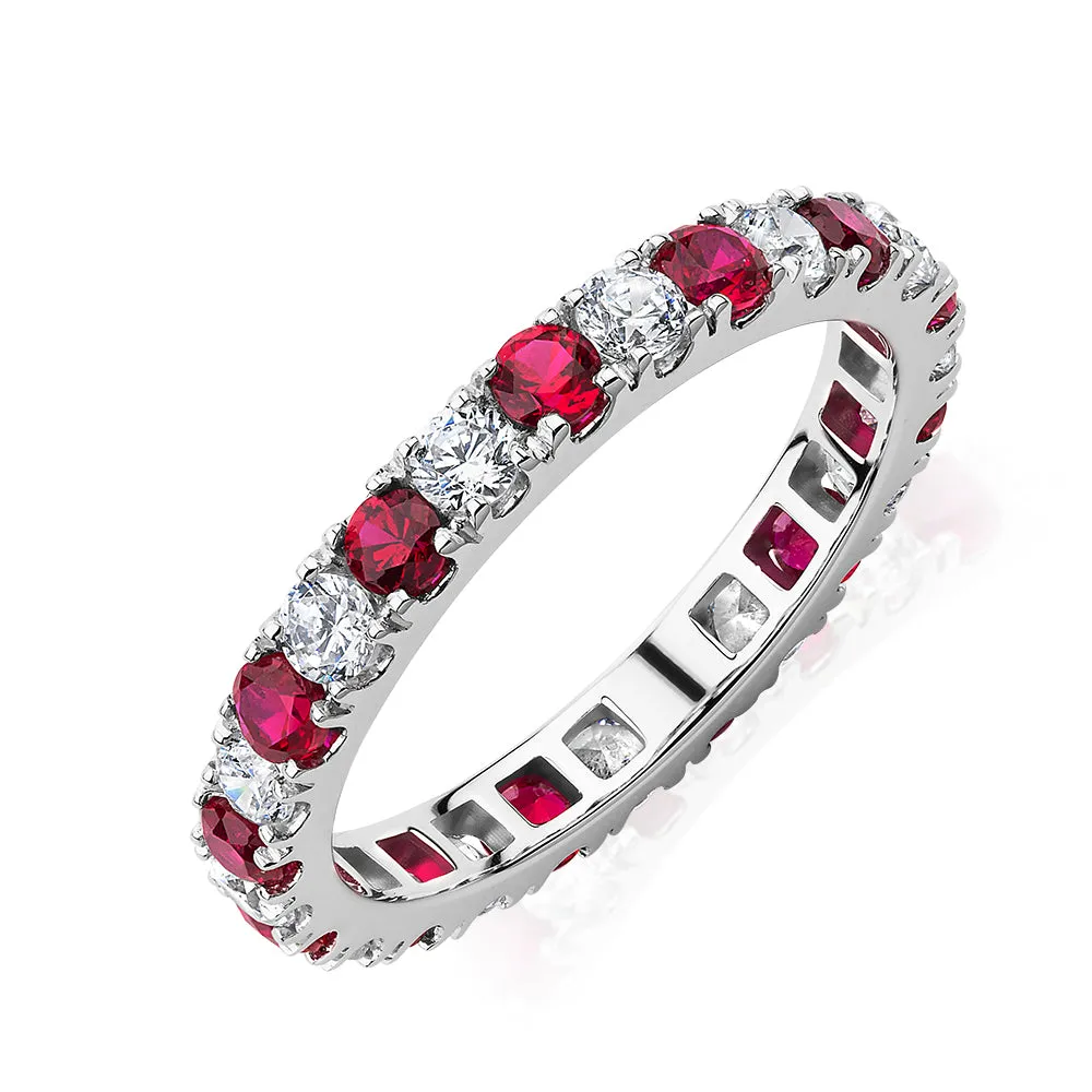 All-rounder eternity band with ruby simulants and 0.78 carats* of diamond simulants in 14 carat white gold