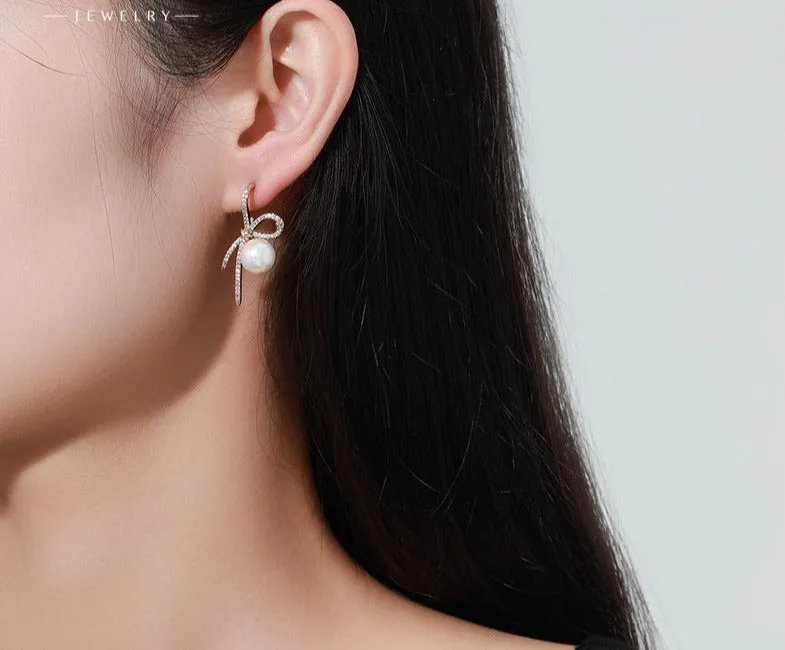 Light luxury niche design high-end bow imitation pearl earrings fashionable light luxury socialite retro temperament